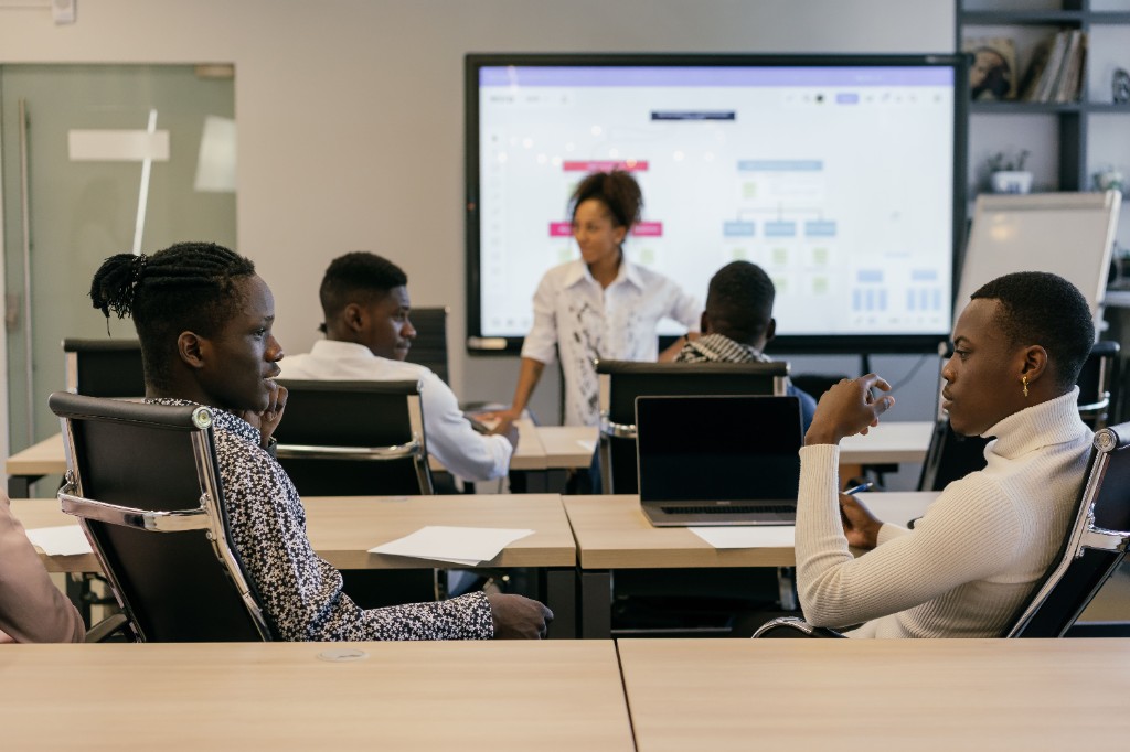 Technology professionals taking part in a collaborative training session